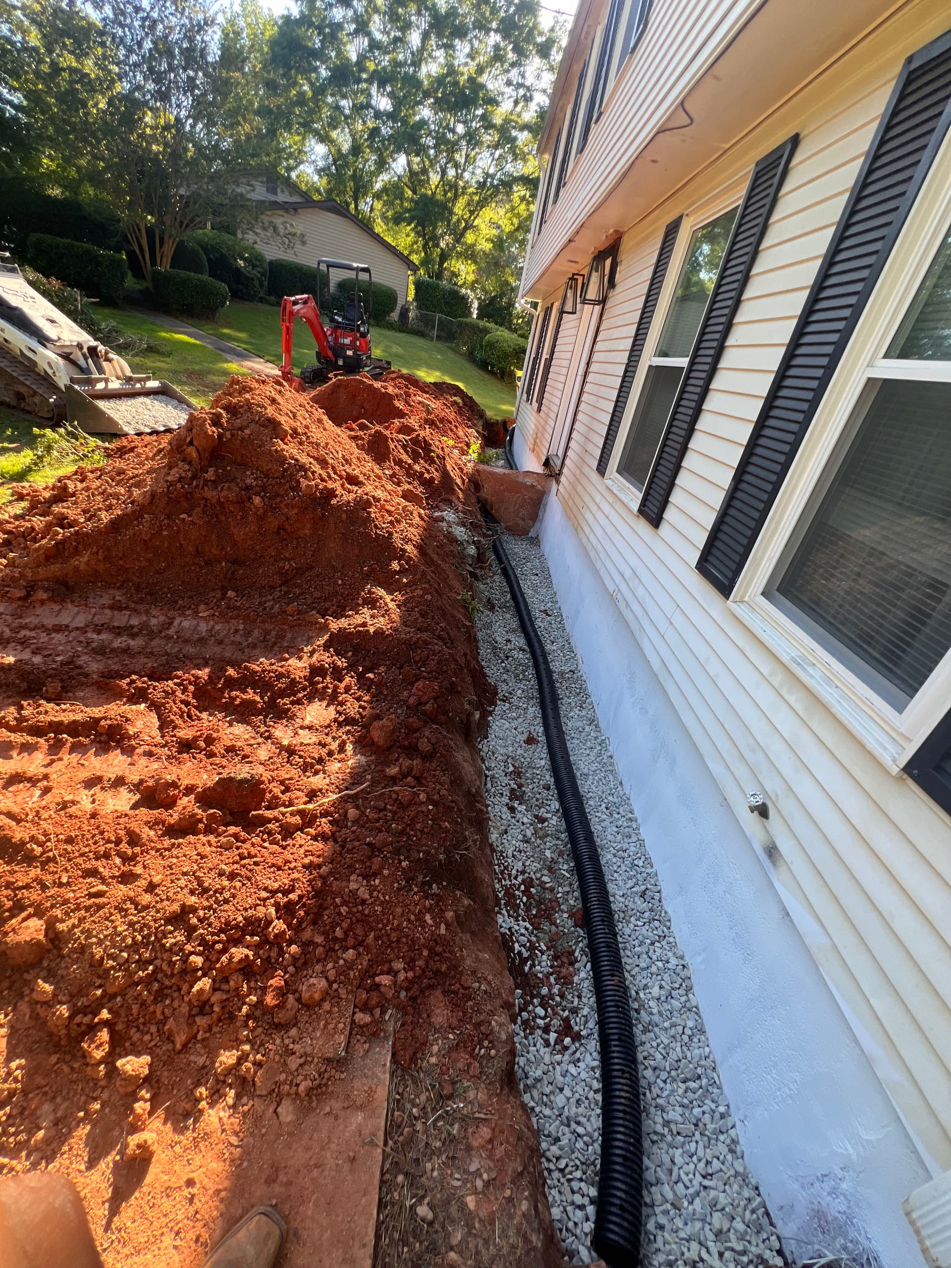 Efficient Drainage Installation Enhances Home Protection image