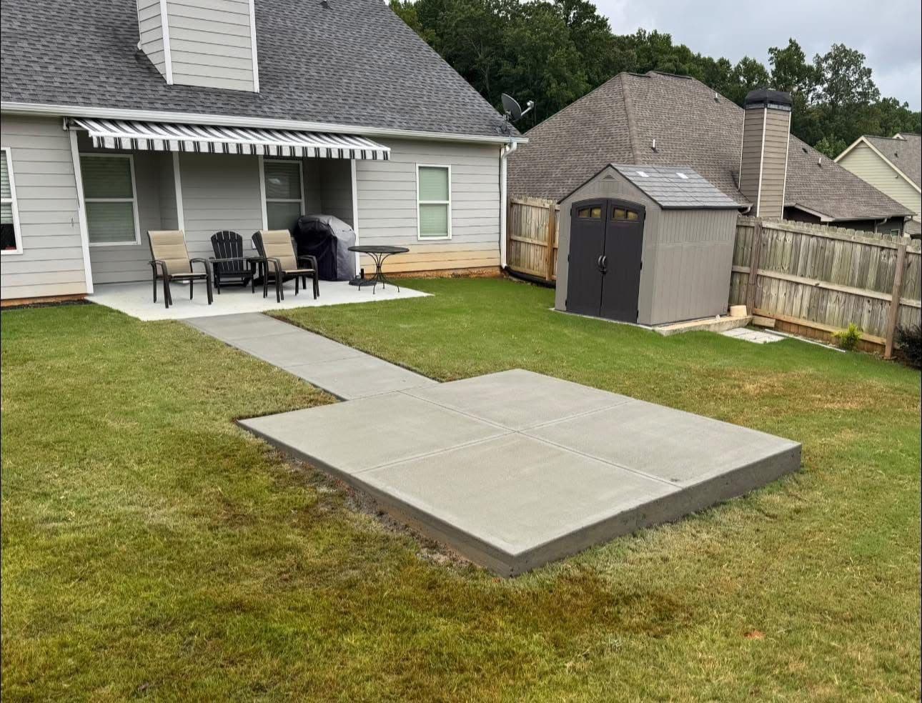 Gallery photos for Concrete Slab Installation for a Cozy Backyard Addition: Image #1