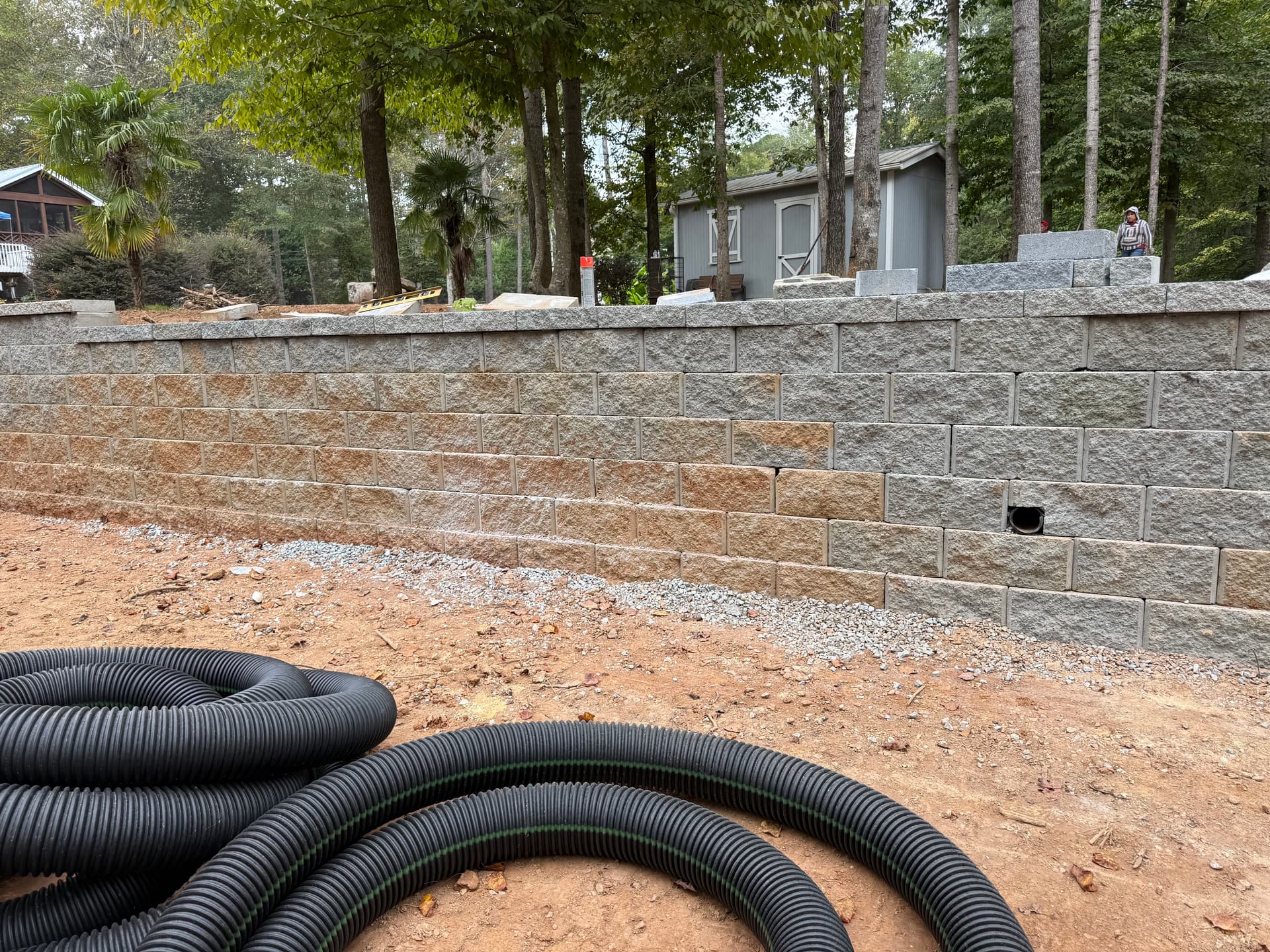 Gallery photos for Mastering Soil and Water Management with Our Latest Retaining Wall Project: Image #1