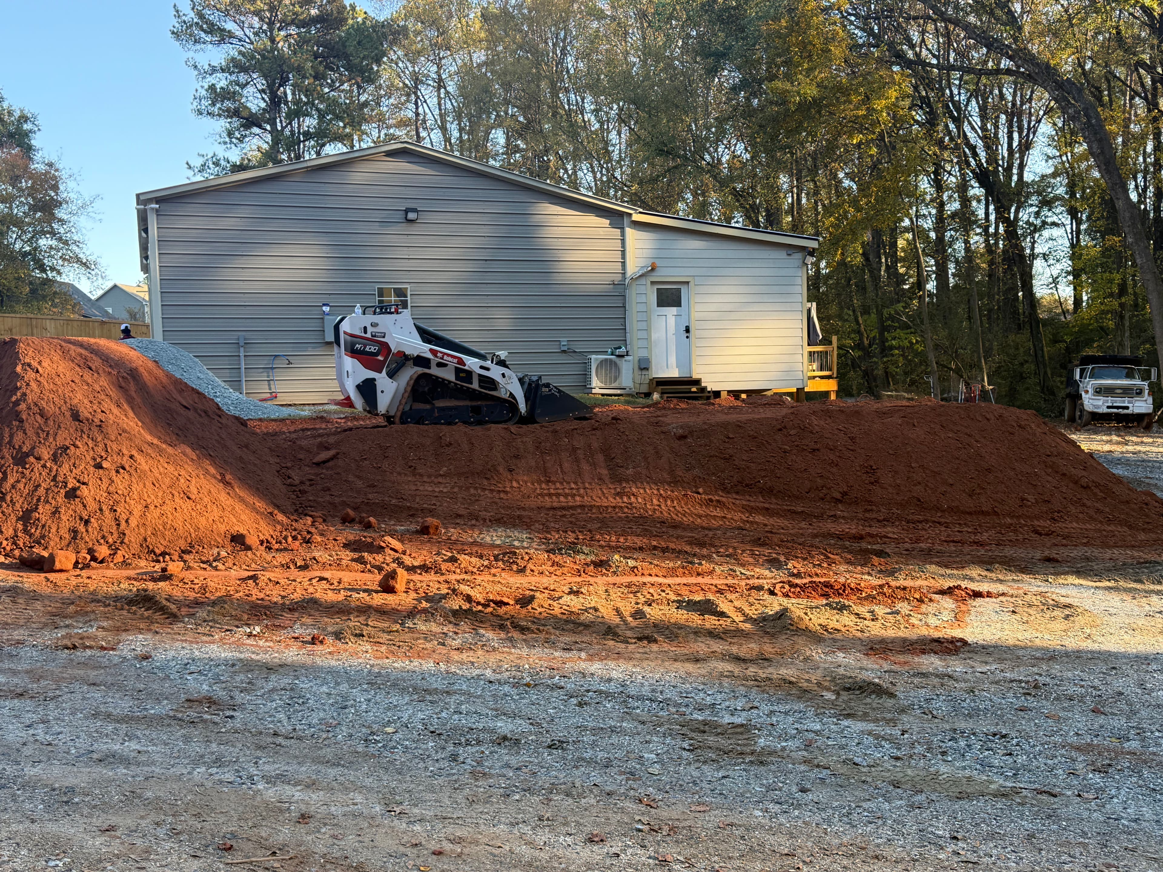 Project From Dirt to a Smooth Driveway Concrete Slab image